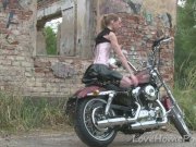 Cute teen is amazed by a big bike 15/16