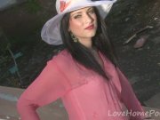 Hot babe poses in a white hat 9/16