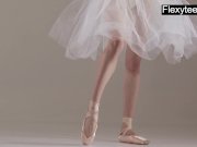 Blonde gymnast performs gymnastics 1/16