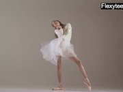 Blonde gymnast performs gymnastics 3/16