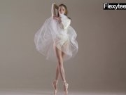 Blonde gymnast performs gymnastics 5/16