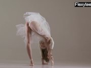 Blonde gymnast performs gymnastics 6/16