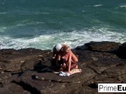 Busty blonde Tarra takes a white and a black cock 8/16