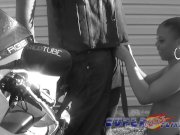 Ebony whore gives Don Whoe head on his bike 13/16