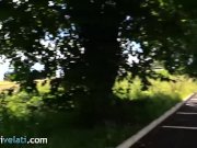 Brunette in black pantyhose shows feet from her on the road 15/16