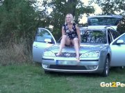 Blonde Pissing - Naughty housewife cleans the car with her golden pee 5/16