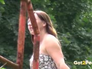 Pee Standing - Curvy brunette relieves herself in the park 16/16
