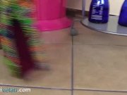 Blonde in leather dress and black pantyhose shows her feet 1/16