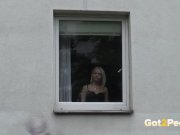 Got2Pee - Blonde babe squats in the window to piss over the edge 2/16