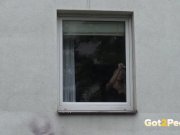 Got2Pee - Blonde babe squats in the window to piss over the edge 3/16