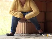Blonde teen pisses on a building site to relieve pee desperation 9/16