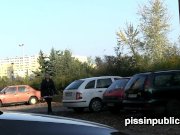 Reckless girls managed to find a sweet spot to piss between parked cars 15/16