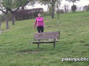 Peeing babes empty their bladders in a park 1/16