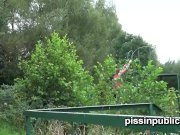 Peeing babes empty their bladders in a park 16/16