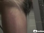 Showering brunette babe masturbates with her fingers 12/16