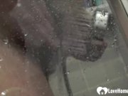 Showering brunette babe masturbates with her fingers 14/16