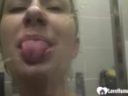 Showering brunette babe masturbates with her fingers 2/16