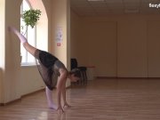 Super flexible Tonya making gymnasts positions before the camera. 10/16