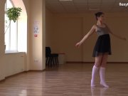 Super flexible Tonya making gymnasts positions before the camera. 3/16