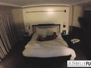 Sexy Jezebelle Bond hangs out in her hotel room 15/16