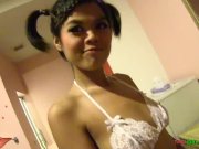 Petite Thai teen loves sucking my cock 1/16