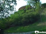 Hot brunette shows some goods during a walk 2/16