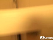 Horny chick plays with her pussy while showering 1/16