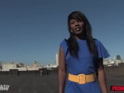 Petite ebony slut gets peed on by two men 1/16