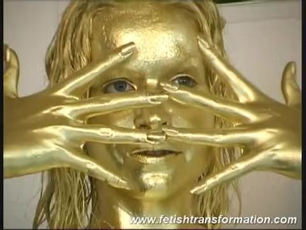 busty girl body painted in gold