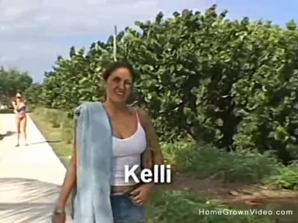Handjob from busty brunette on beach