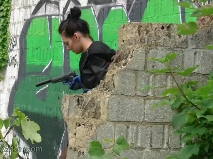 Naked brunette puts on tight leather pants jacket as babe becomes gangster