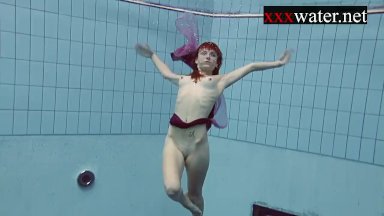 Smoking hot Russian redhead Ala in the pool